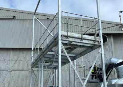 vertical access ladder with platform mezzanine